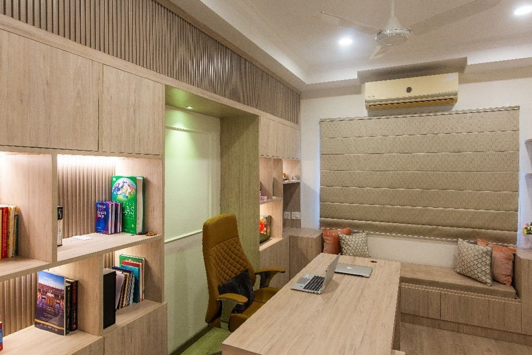 A beautifully designed study room with wood by Offcentered Infrastructure.